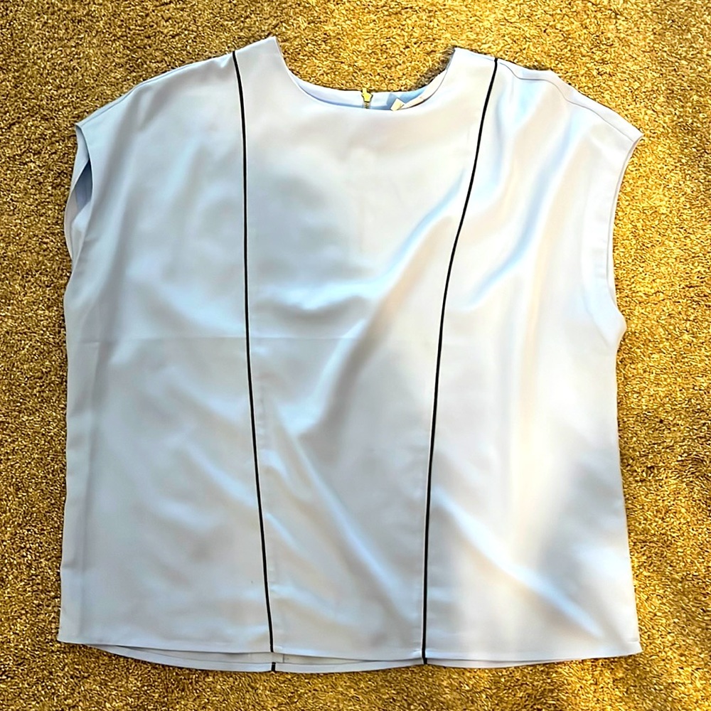 Sleeveless work top perfect for with a blazer